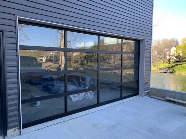 Contemporary Black Aluminum & Clear Tempered Glass Garage Door