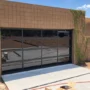 Contemporary Black Aluminum & Black Laminate (Privacy) Glass Garage Door