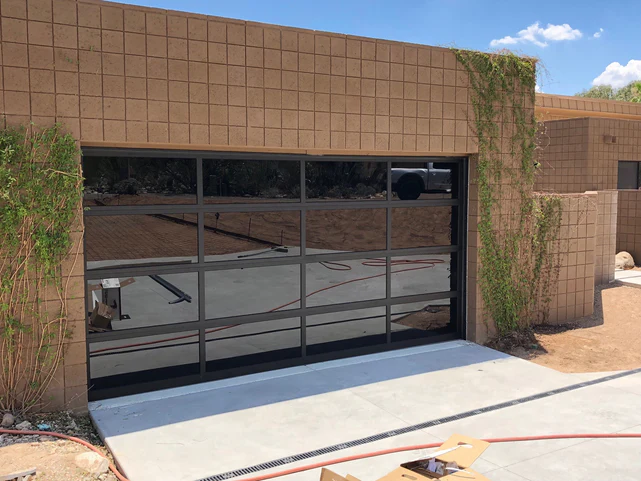 Contemporary Black Aluminum & Black Laminate (Privacy) Glass Garage Door