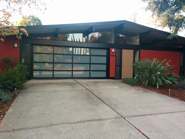 Contemporary Black Aluminum & White Laminate (Privacy) Glass Garage Door